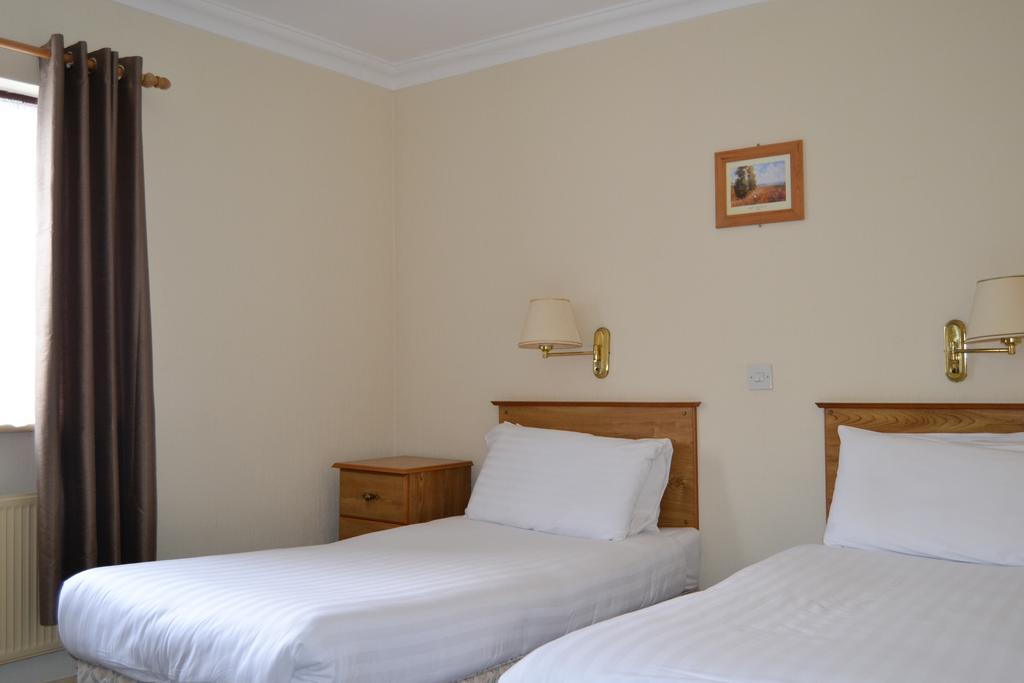 مولاغمور The Beach Hotel الغرفة الصورة